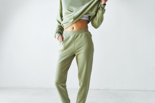 woman wearing green joggers