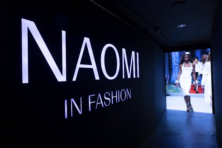 Naomi In Fashion written in large letters