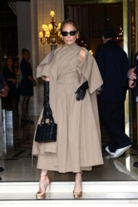 Image may contain Jennifer Lopez Person Clothing Glove Footwear High Heel Shoe Accessories Bag Handbag and Adult
