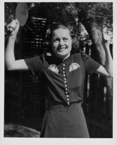 Image may contain Olivia de Havilland Face Head Person Photography Portrait Adult Happy Smile Body Part and Finger