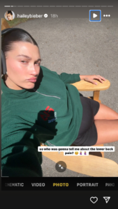 Image may contain Hailey Baldwin Clothing TShirt Photography Person Body Part Finger Hand Face Head and Portrait