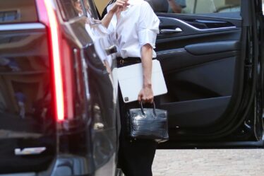 Image may contain Jennifer Lopez Accessories Glasses Bag Handbag Adult Person Clothing Footwear Shoe and Car