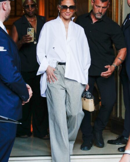 Jennifer Lopez left the hotel in Paris after the L Show during Paris Fashion Week. As she headed to the airport, Jen chose a comfortable outfit of straight pants and a white shirt.
