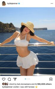 Image may contain Clothing Swimwear Hat Adult Person Sun Hat Beachwear Face Head Photography and Portrait