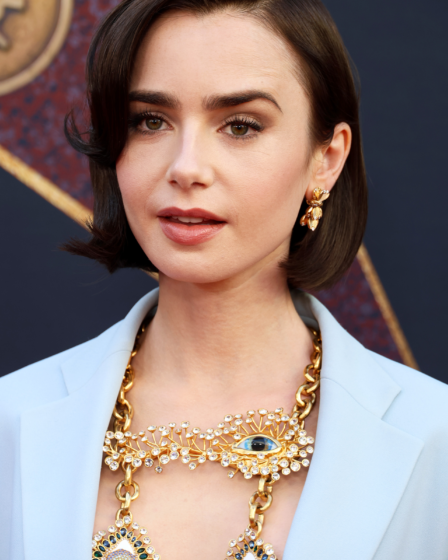 Image may contain Lily Collins Accessories Jewelry Necklace Face Head Person Adult Wedding and Pendant