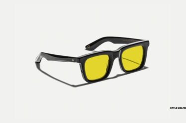 pair of moscot yellow lens sunglasses with black frames