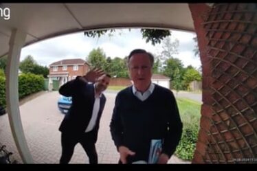 Cameron and another man viewed through doorbell camera outside someone's house