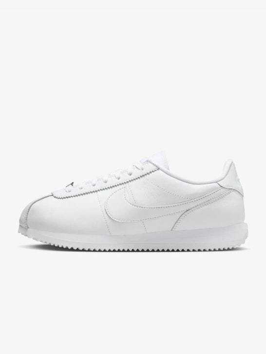 white leather nike cortez sneaker