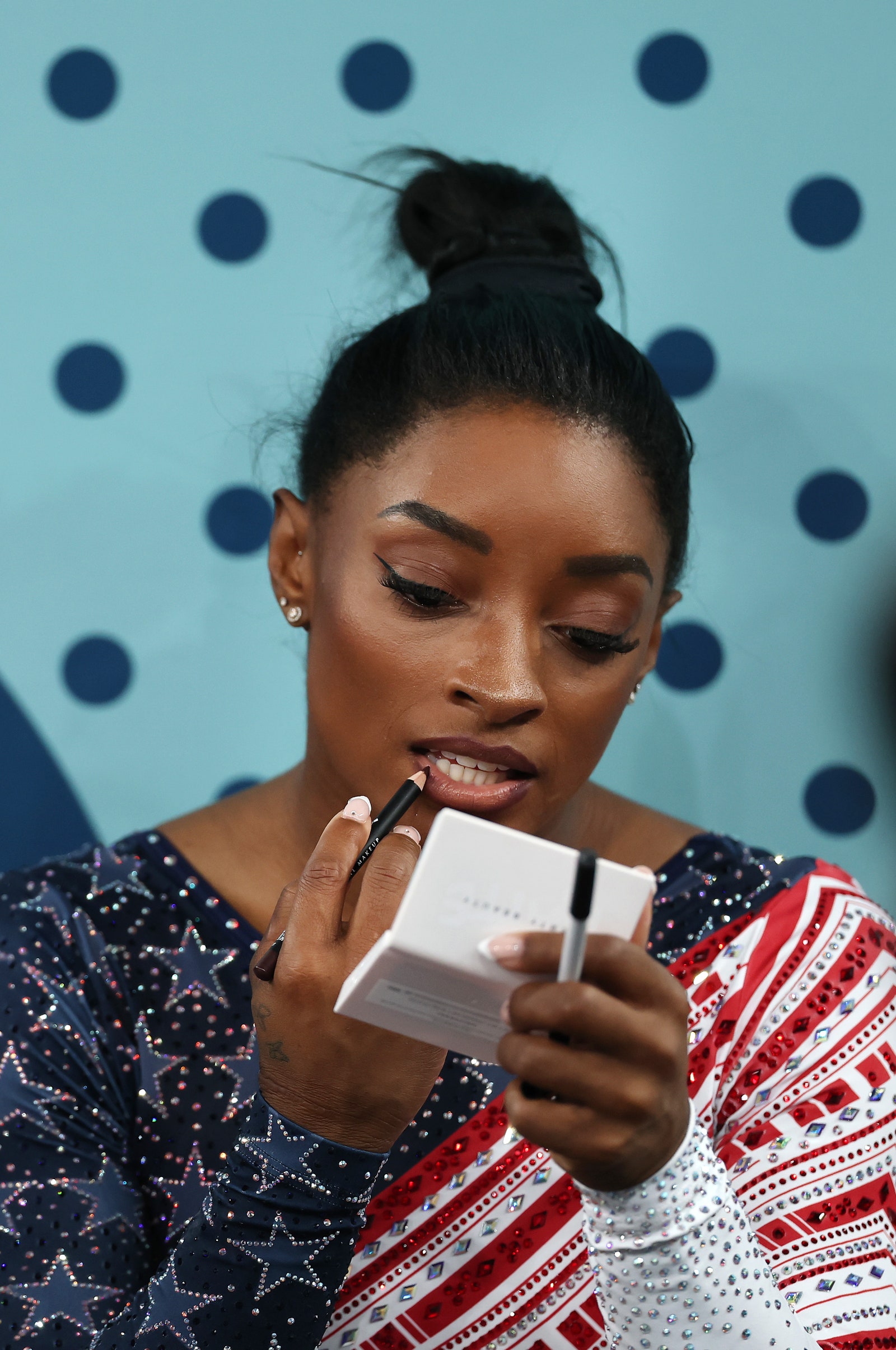 Simone Biles Just Revealed Her GoTo Gymnastics Lip Combo and Setting