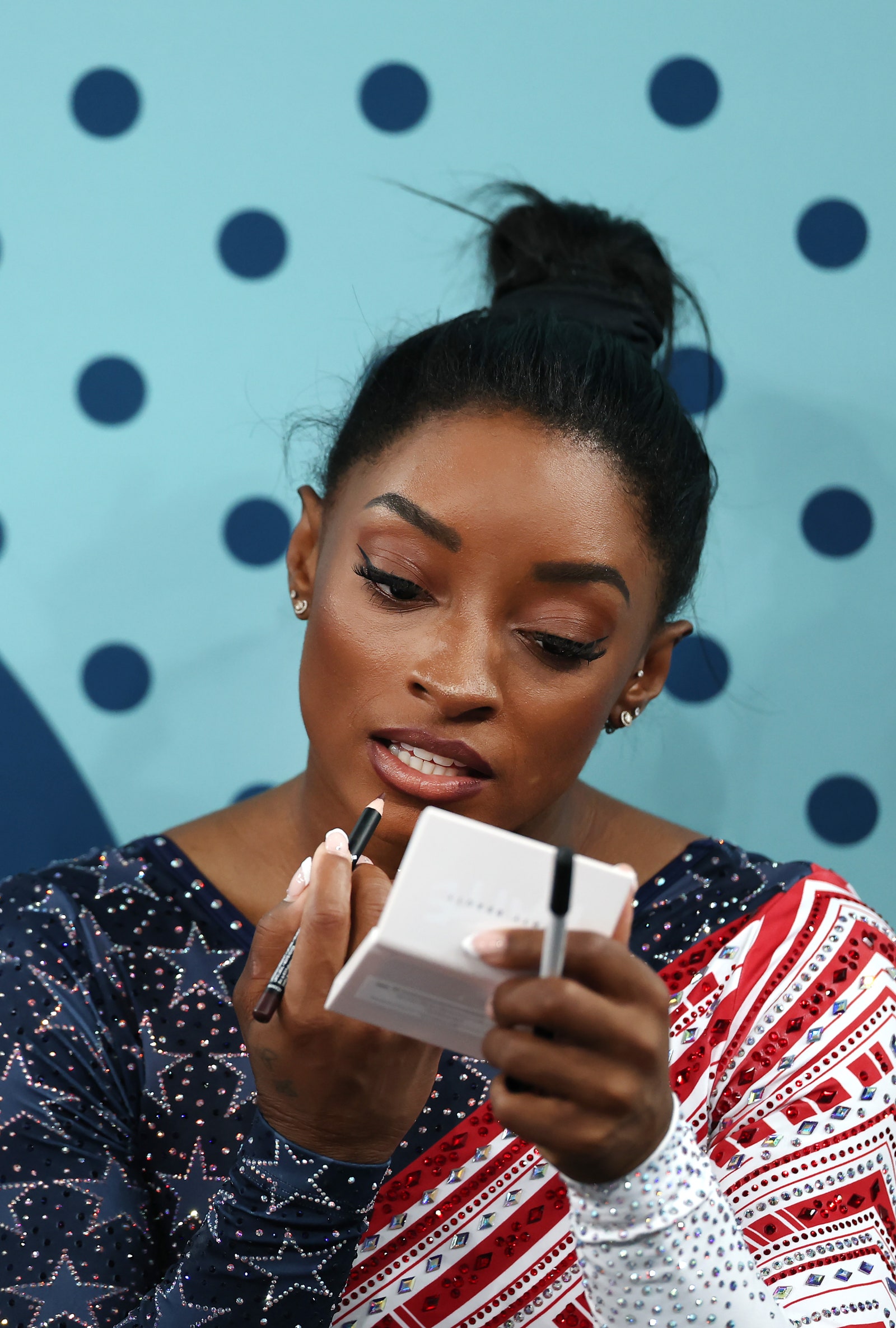 Simone Biles Just Revealed Her GoTo Gymnastics Lip Combo and Setting