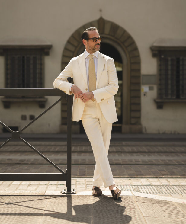 An elegant summer outfit idea with a cream linen suit