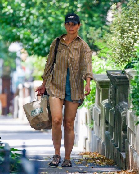 Katie Holmes enjoys summer in New York City in denim shorts and oversized shirt
