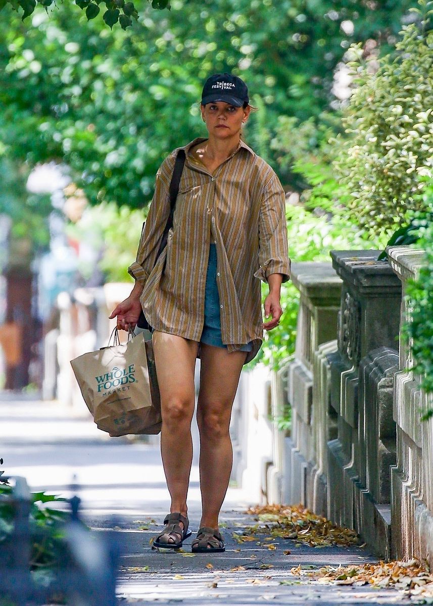 Katie Holmes enjoys summer in New York City in denim shorts and oversized shirt