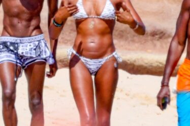 Naomi Campbell on the beach in Sardinia