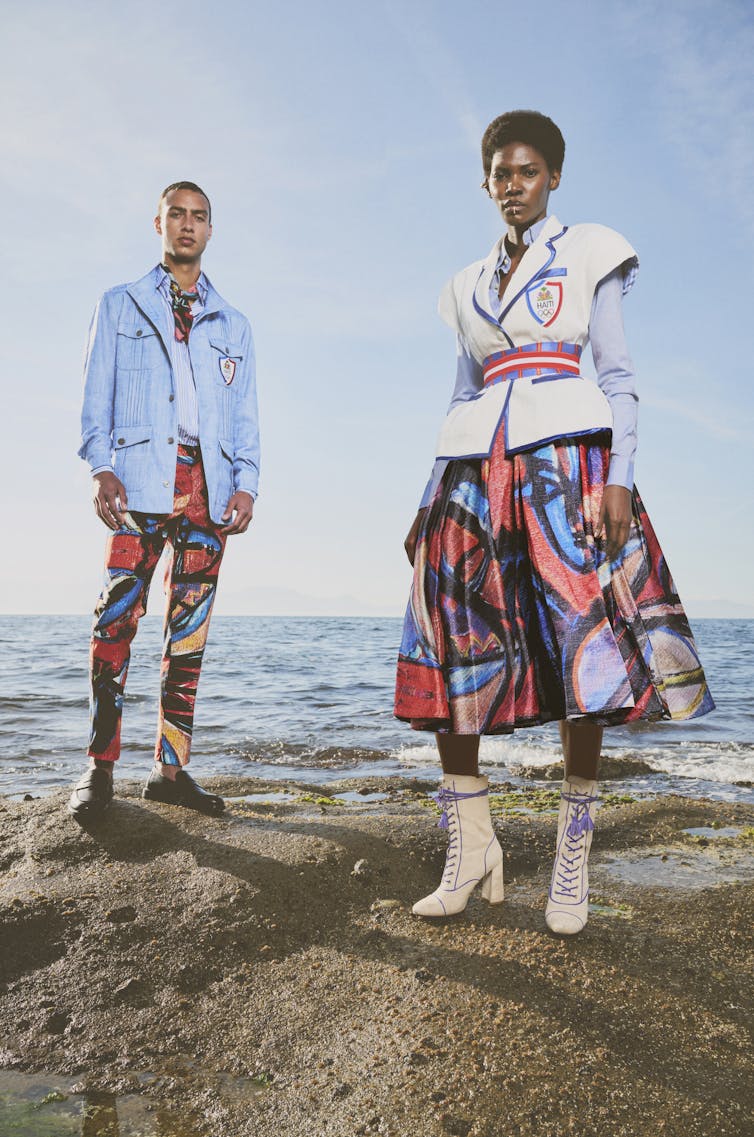 A man and a woman in bright patterns.