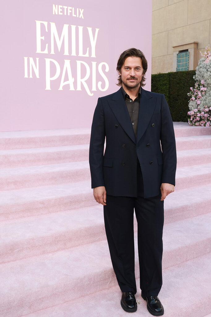 Lucas Bravo attends the Emily In Paris Season 4 Part 1 LA Premiere