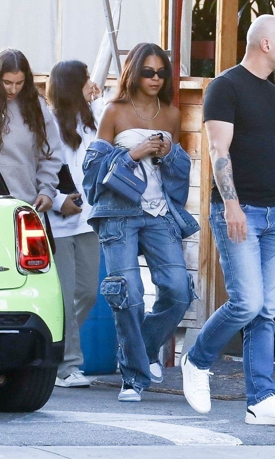 Blue Ivy Carter, all grown up at 12, looked stylish in a tube top and cargo jeans