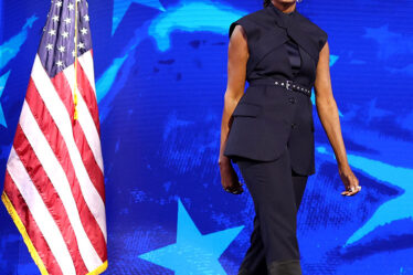 Former US First Lady Michelle Obama arrives to speak on the second day of the Democratic National Convention (DNC)