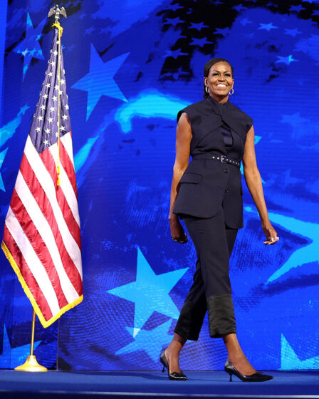 Former US First Lady Michelle Obama arrives to speak on the second day of the Democratic National Convention (DNC)