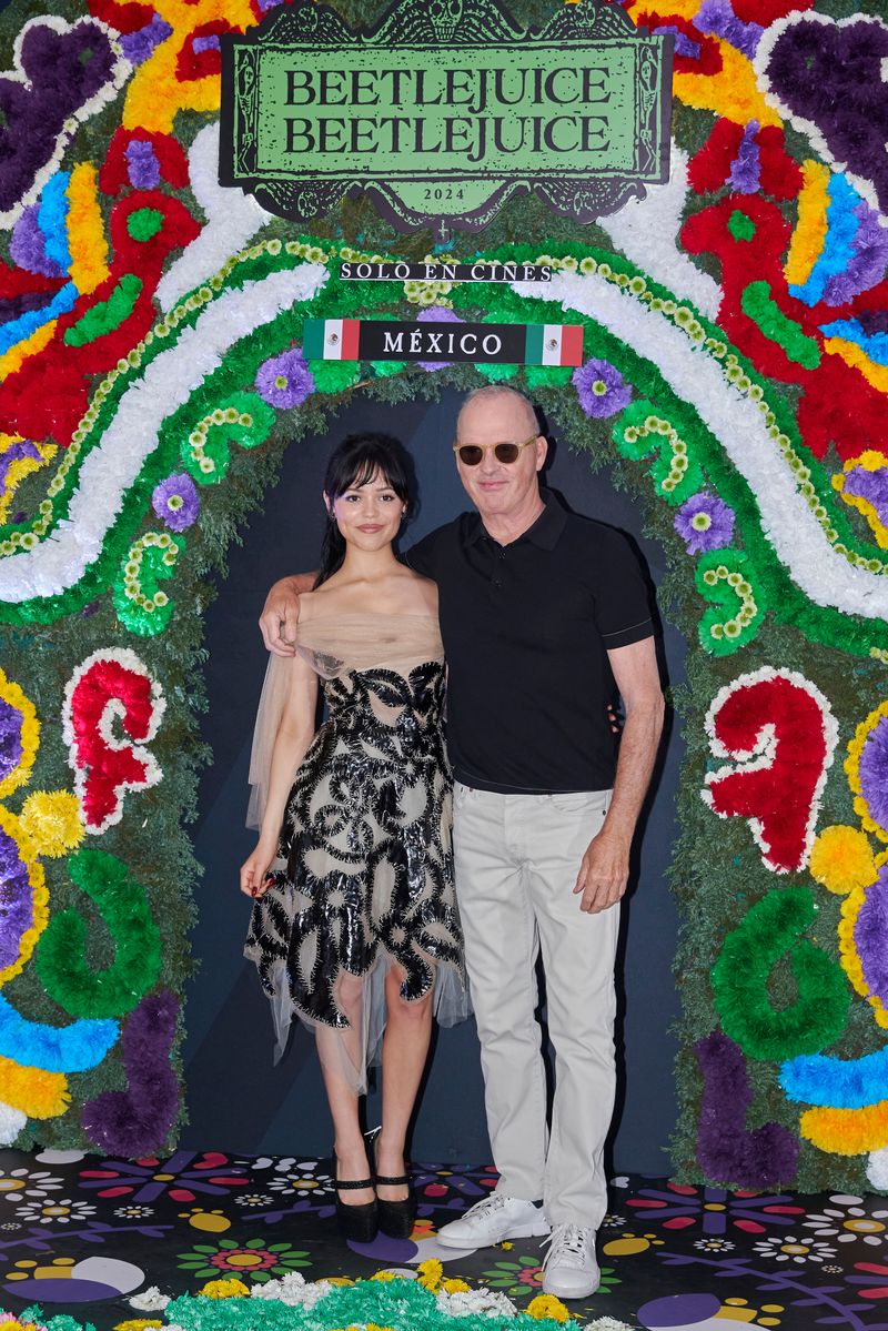 Jenna Ortega and Michael Keaton pose during the photocall for the movie 'Beetlejuice Beetlejuice' at the Four Seasons Hotel on August 13, 2024, in Mexico City, Mexico. (Photo by Jaime Nogales/Medios y Media/Getty Images)