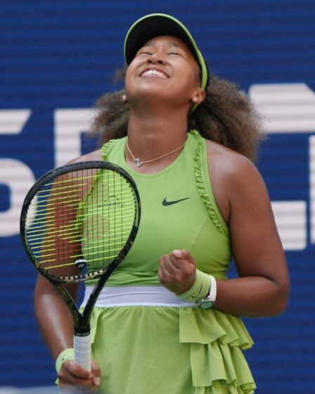 Image may contain Naomi Osaka Racket Sport Tennis Tennis Racket Adult Person Accessories Jewelry and Necklace