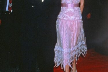 Princess Diana wears a pink chiffon dress, decorated with rhinestones, crystal beads, and pearl droplets designed by Zandra Rhodes.