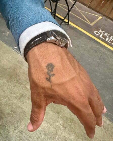 Jonathon Johnson rose tattoo hand watch arm