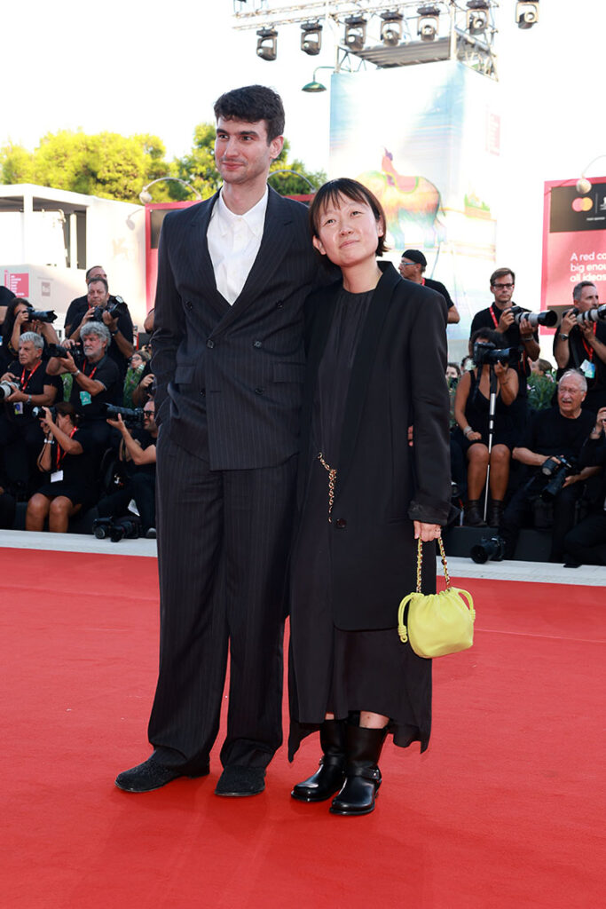 Justin Kuritzkes and Celine Song attend the "Queer" red carpet during the 81st Venice International Film Festival