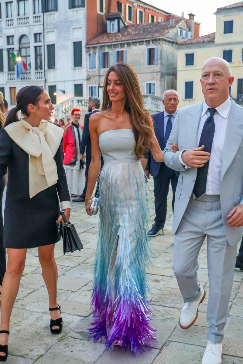 Amal Clooney arrives at the Cartier private party in Venice with a chic and elegant dress