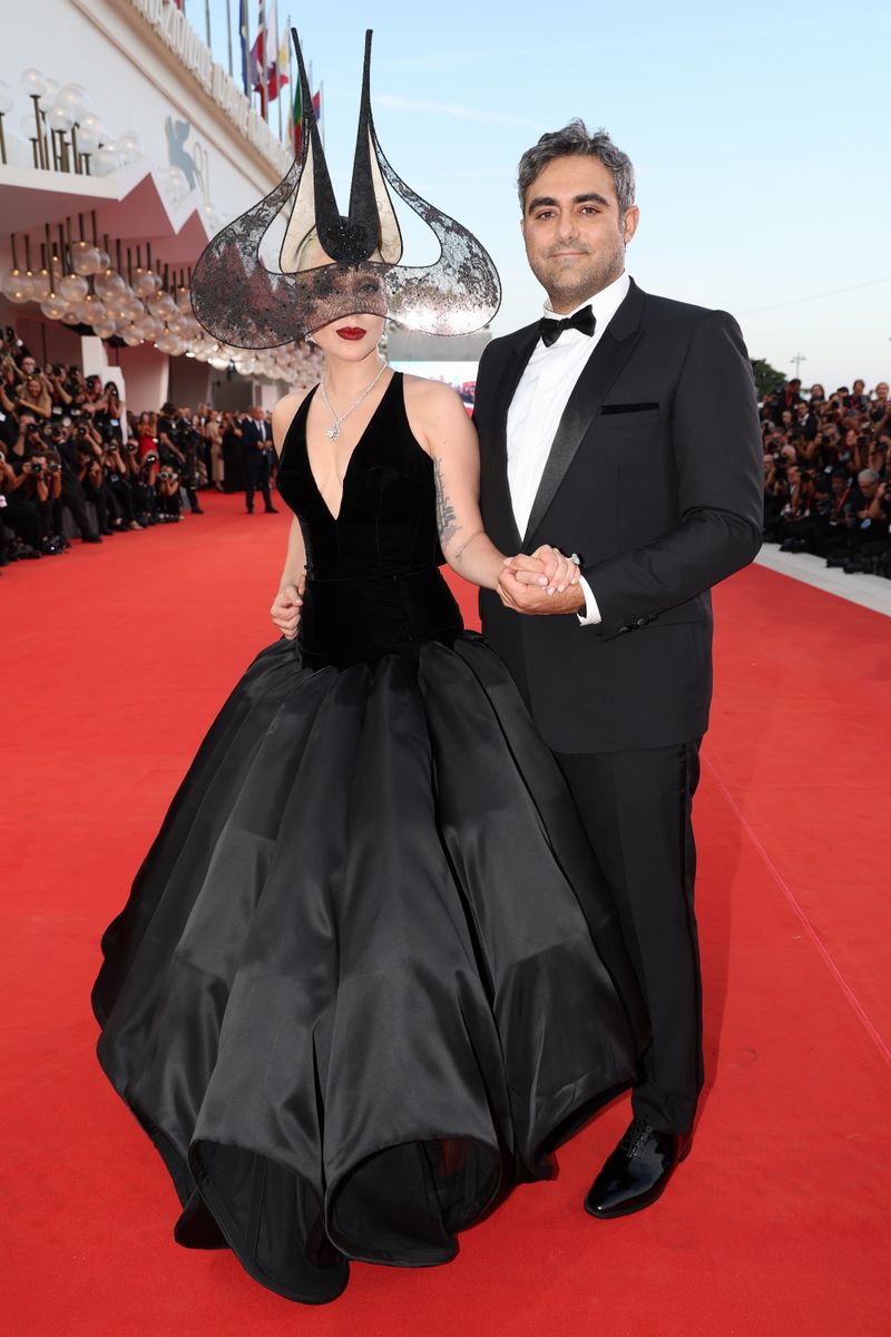 Lady Gaga and Michael Polansky attend the "Joker: Folie Ã  Deux" red carpet during the 81st Venice International Film Festival 