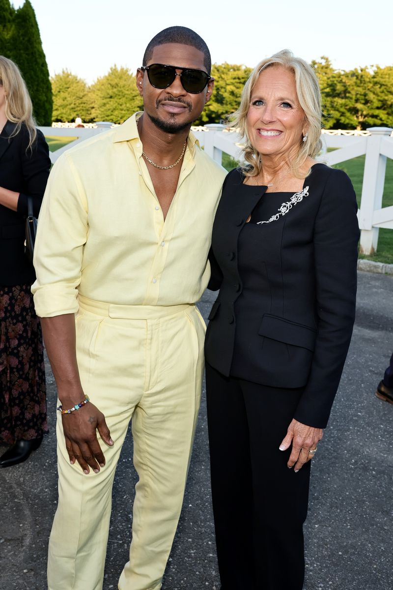 Usher and First Lady of the United States, Dr. Jill Biden attend Ralph Lauren fashion show during New York Fashion Week September 2024 at Khalily Stables on September 05, 2024 in Bridgehampton, New York. (Photo by Theo Wargo/Getty Images)