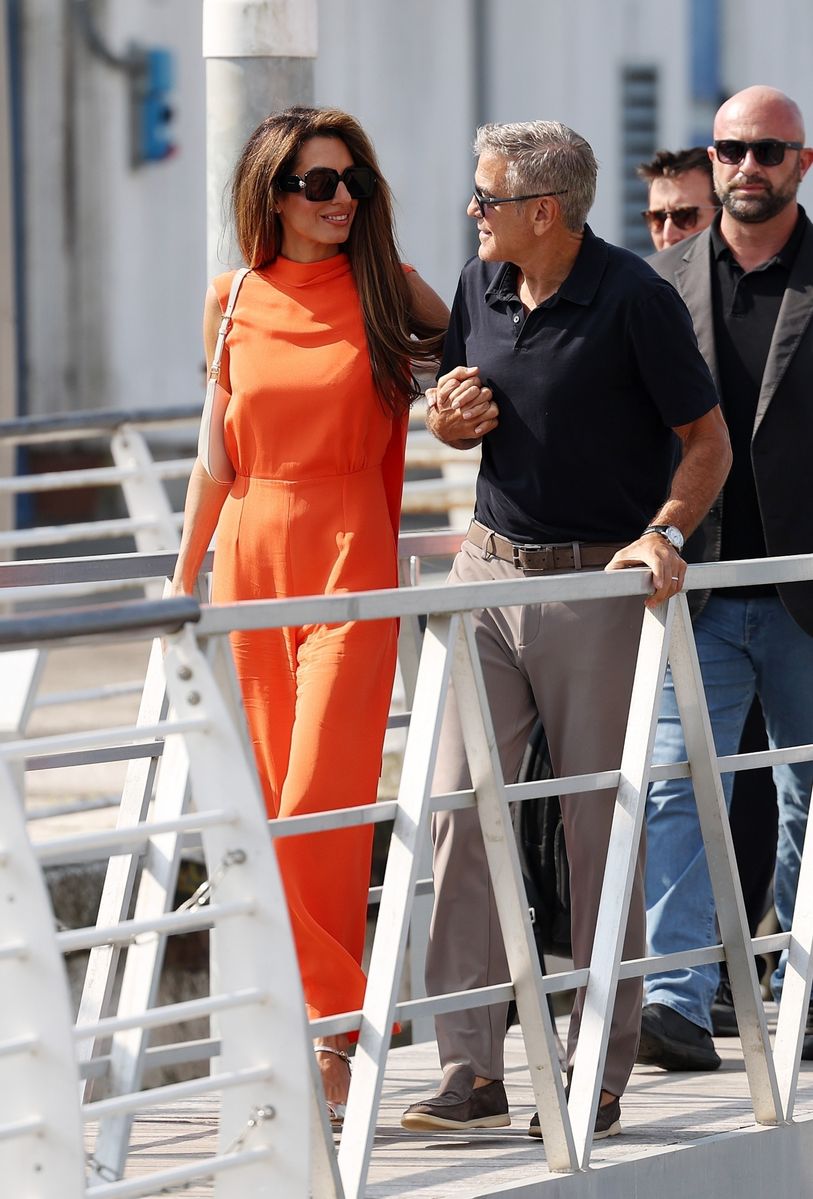 George Clooney and wife Amal are seen leaving Venice's Marco Polo airport after attending the 81st Venice International Film Festival at the Venice Lido.