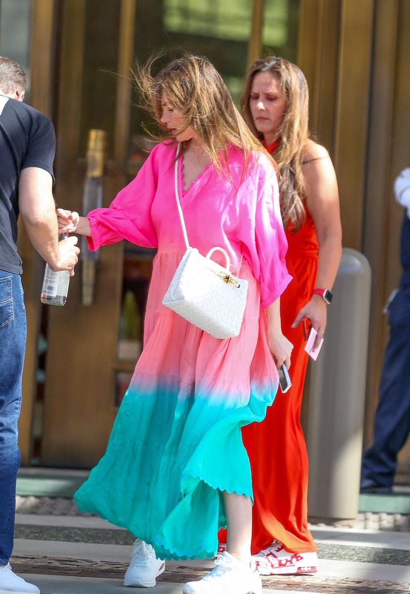 Sofia Vergara wears a bright colored dress to lunch with friends at Waldorf in Los Angeles. 