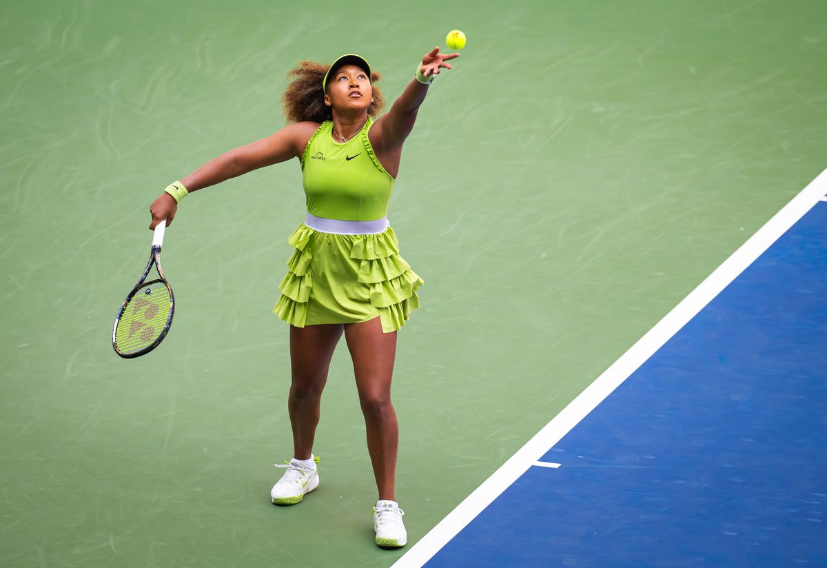 Naomi Osaka of Japan in action against Jelena Ostapenko of Latvia in the first round on Day 2 of the US Open 