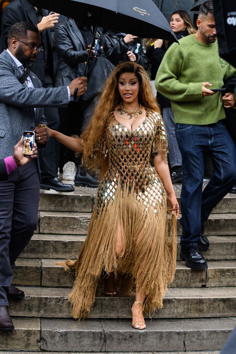 Cardi B wears a Rabanne dress and necklace with Tom Ford shoes outside the Rabanne show during Womenswear Spring/Summer 2025 as part of Paris Fashion Week on September 25, 2024 in Paris, France. (Photo by Kirstin Sinclair/Getty Images)