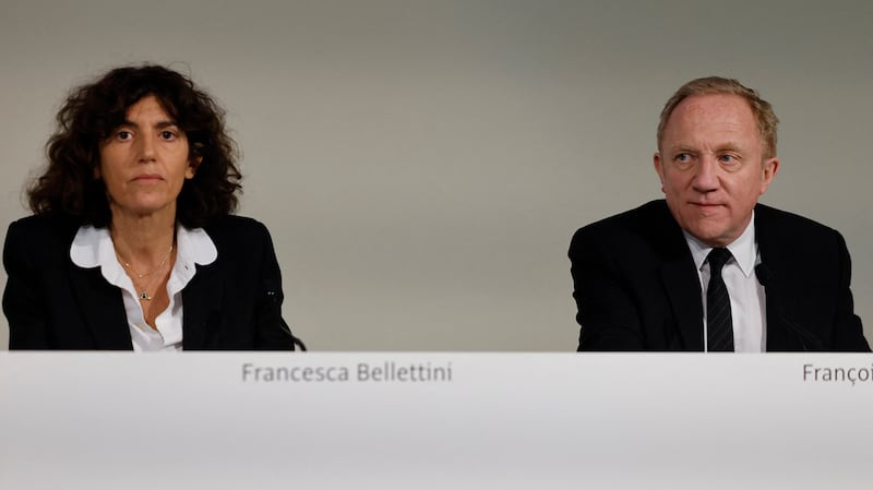 Kering's Deputy CEO, in charge of Brand Development Francesca Bellettini (L) and Chairman and Chief Executive Officer Francois-Henri Pinault (R) attend the shareholders's Annual General Meeting at the group headquarters in Paris.