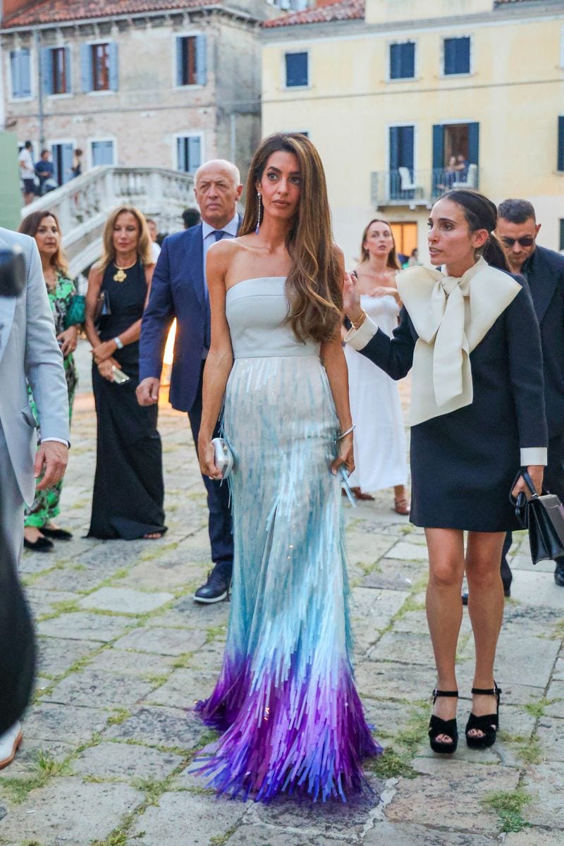 Amal Clooney arrives at the Cartier private party in Venice with a chic and elegant dress