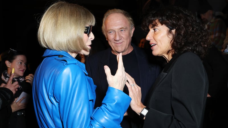 Dame Anna Wintour, CEO of Kering Francois-Henri Pinault and Francesca Bellettini attend the McQueen Spring/Summer 2025.