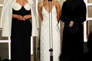 Karla Sofía Gascón, Zoe Saldana, and Selena Gomez speak onstage during the TIFF Tribute Awards during the 2024 Toronto International Film Festival