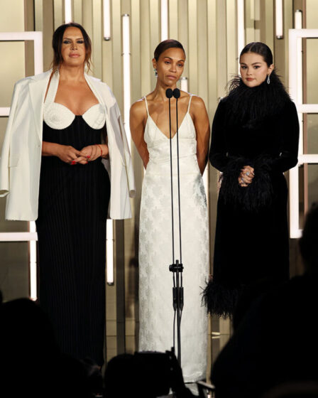 Karla Sofía Gascón, Zoe Saldana, and Selena Gomez speak onstage during the TIFF Tribute Awards during the 2024 Toronto International Film Festival