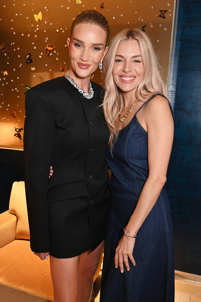 Rosie Huntington-Whiteley and Sienna Miller attend the Tiffany & Co. "Windows Of Wonder" takeover celebration at Selfridges 