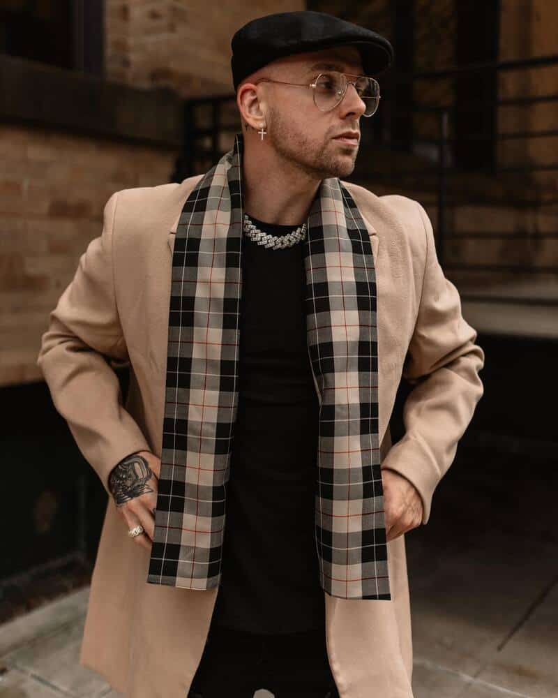 man wearing the Coofandy's Wool Blend Coat with Plaid Scarf