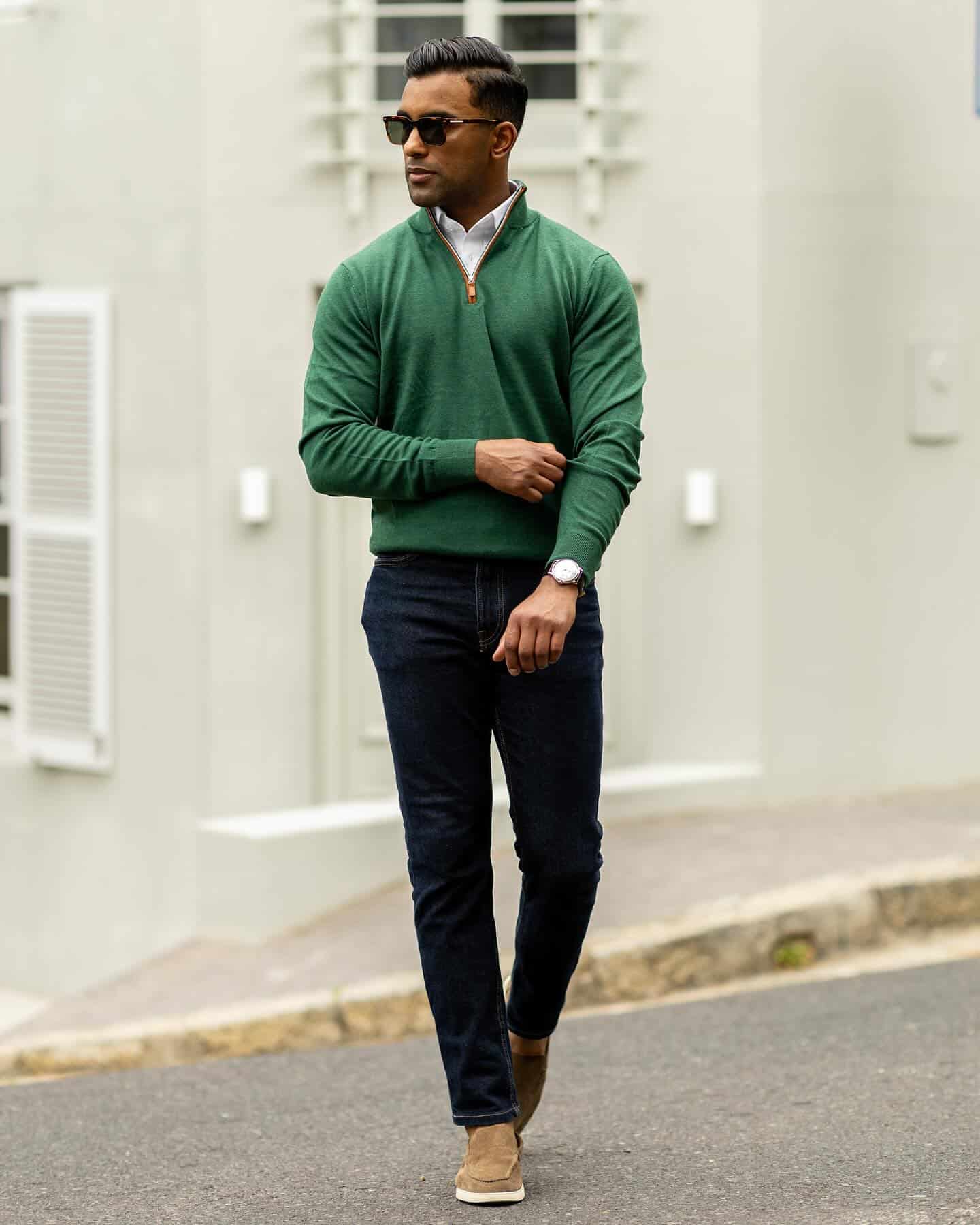 man wearing the collars and co sweater in green color