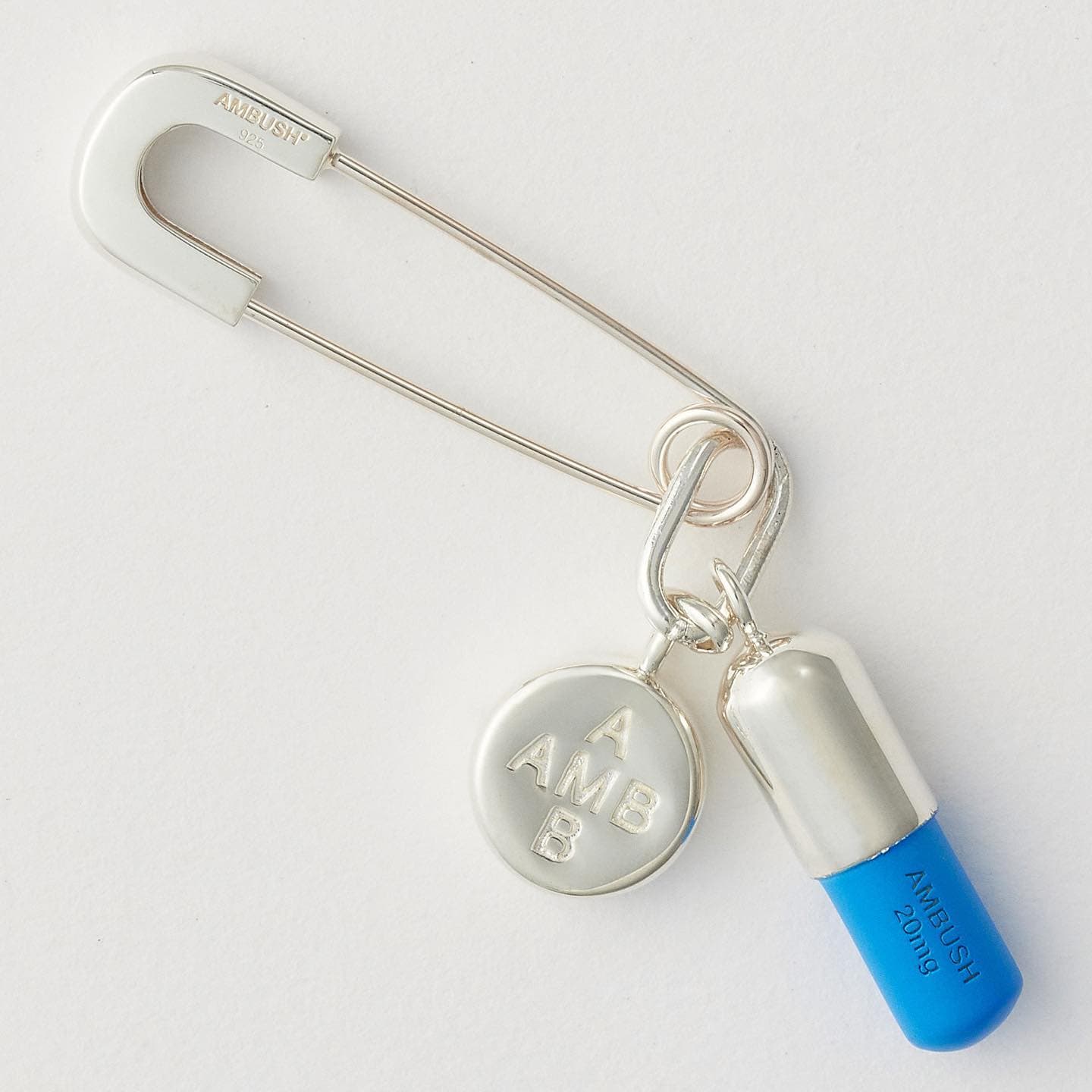 the pill charm earring by ambush