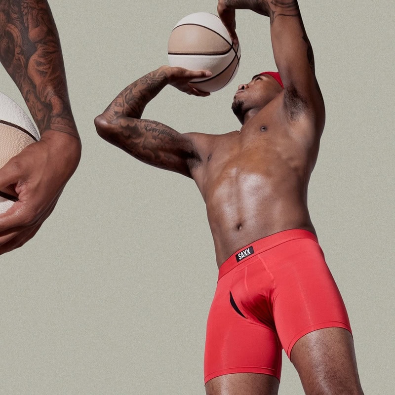 man playing basketball wearing a Saxx boxer brief