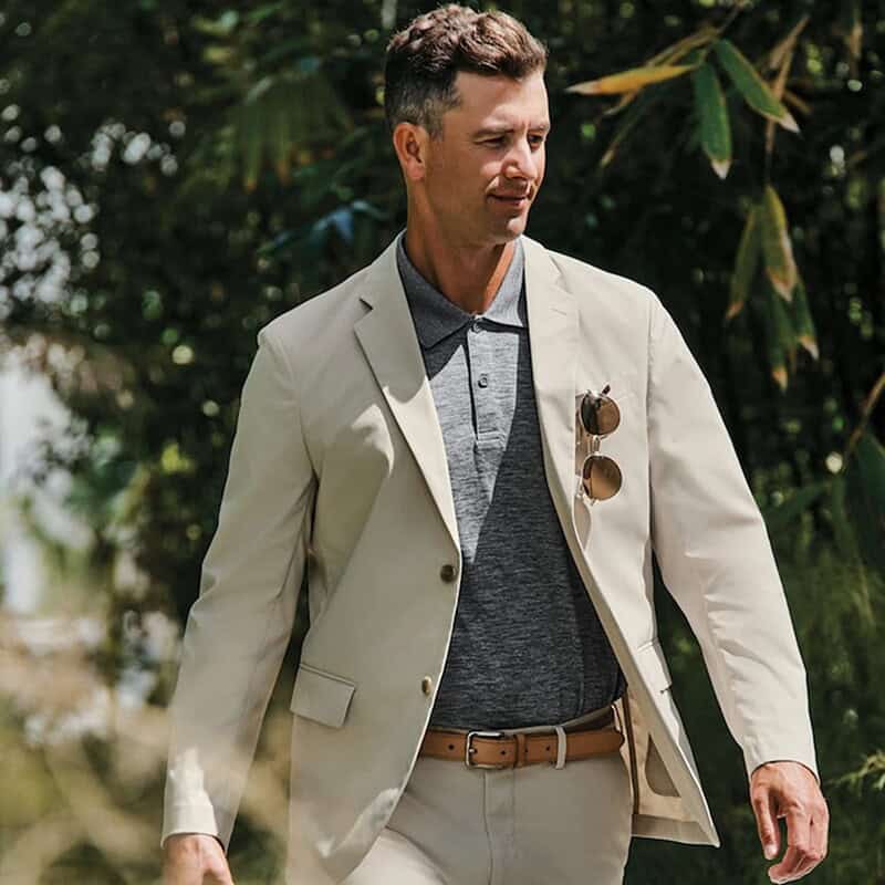 man wearing a khaki suit by coofandy