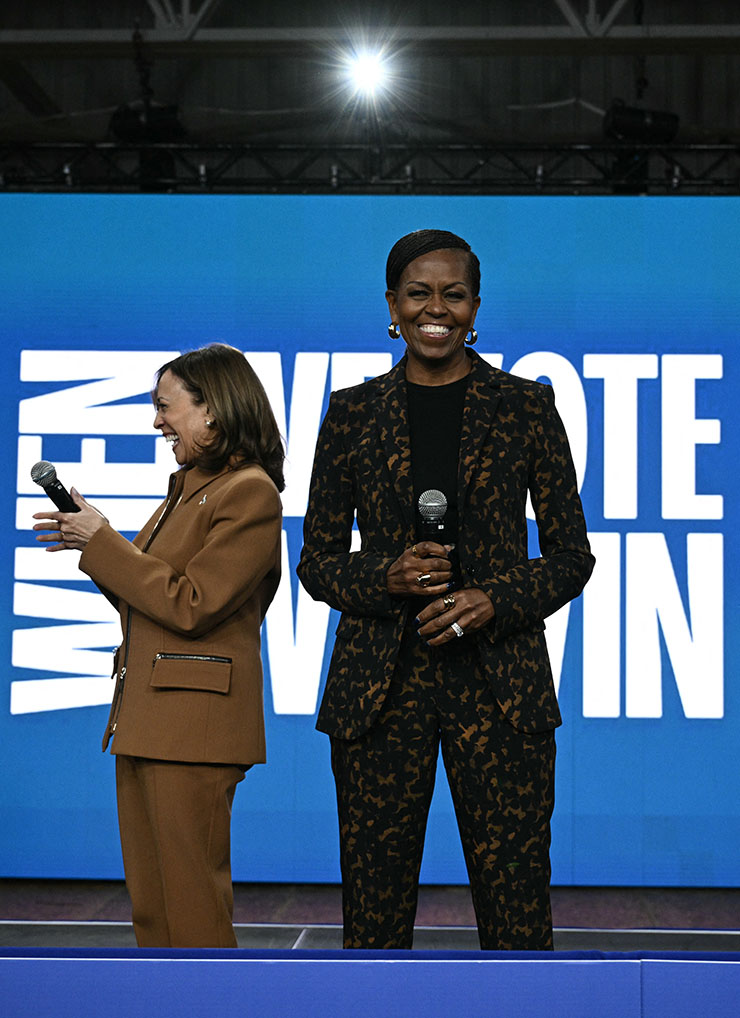 US Vice President and Democratic presidential candidate Kamala Harris and former US First Lady Michelle Obama campaign together at the Wings Event Center in Kalamazoo, Michigan