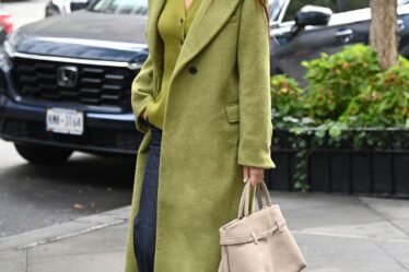 Katie Holmes looks stylish in a matching green coat and top whilst out in New York City