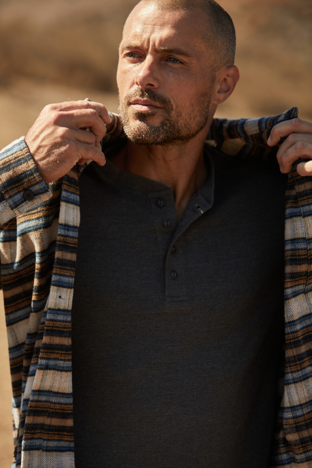 man wearing a Henley t-shirt under an overshirt by Weatherproof Vintage