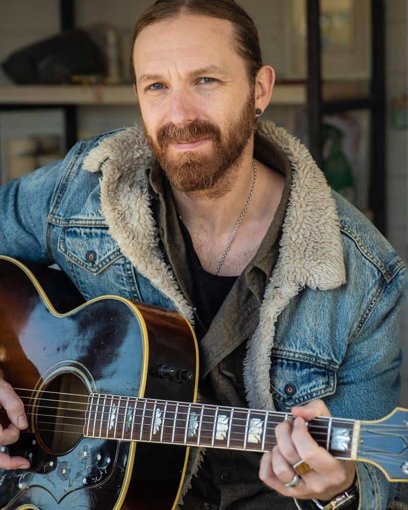 man wearing shearling jacket by levis